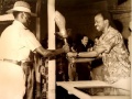 1961 President Nyerere hands over the Uhuru Torch to Brigadier-General Nyirenda.jpg