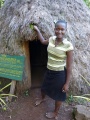 2012 Chagga Frau vor traditioneller Behausung.jpg