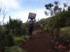 <small><b>Bilder von der Marangu Route aus dem Kilimanjaro-Gipfelbuch-Eintrag-Nr.: 269</b><br>Eintrag-Titel : Meine Besteigung Februar 2013 von Roland Neugebauer vom 2013-02-18 16:38:35<br><b>Bild-Beschreibung : Porter - Kisten</b></small>