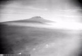 ETHBIB Bildarchiv LBS MH02-07-0104 262495 Kilimandjaro-Gebirge mit Schira-Kamm von W. aus ca. 60 km Entfernung.jpg